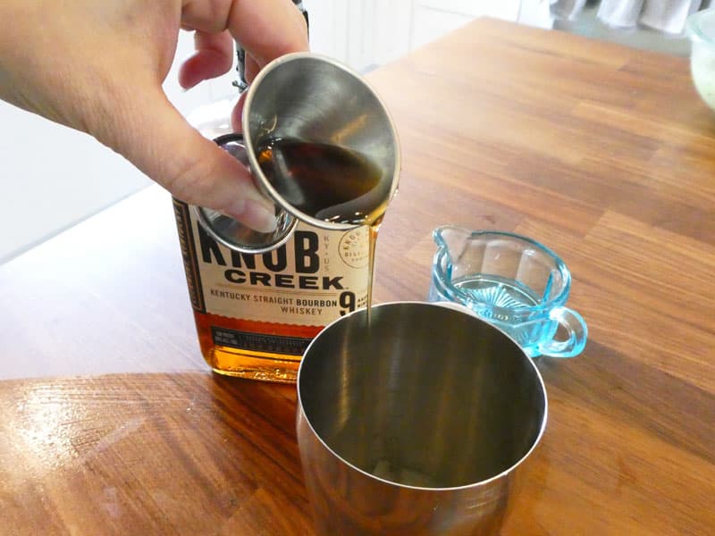 syrup pouring into shaker