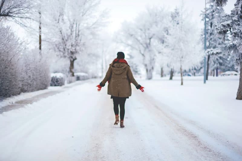 woman walking in snow