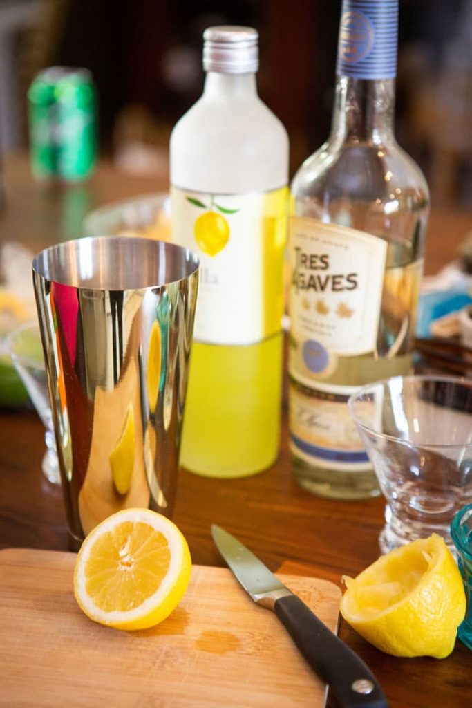 Tequila and Limoncello bottles and cocktail shaker.